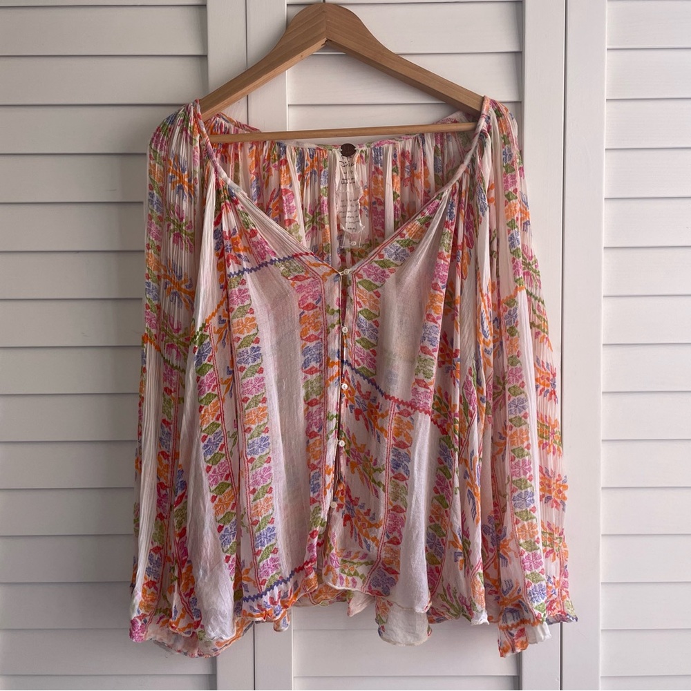 Great condition Free People button up blouse. Size small.
